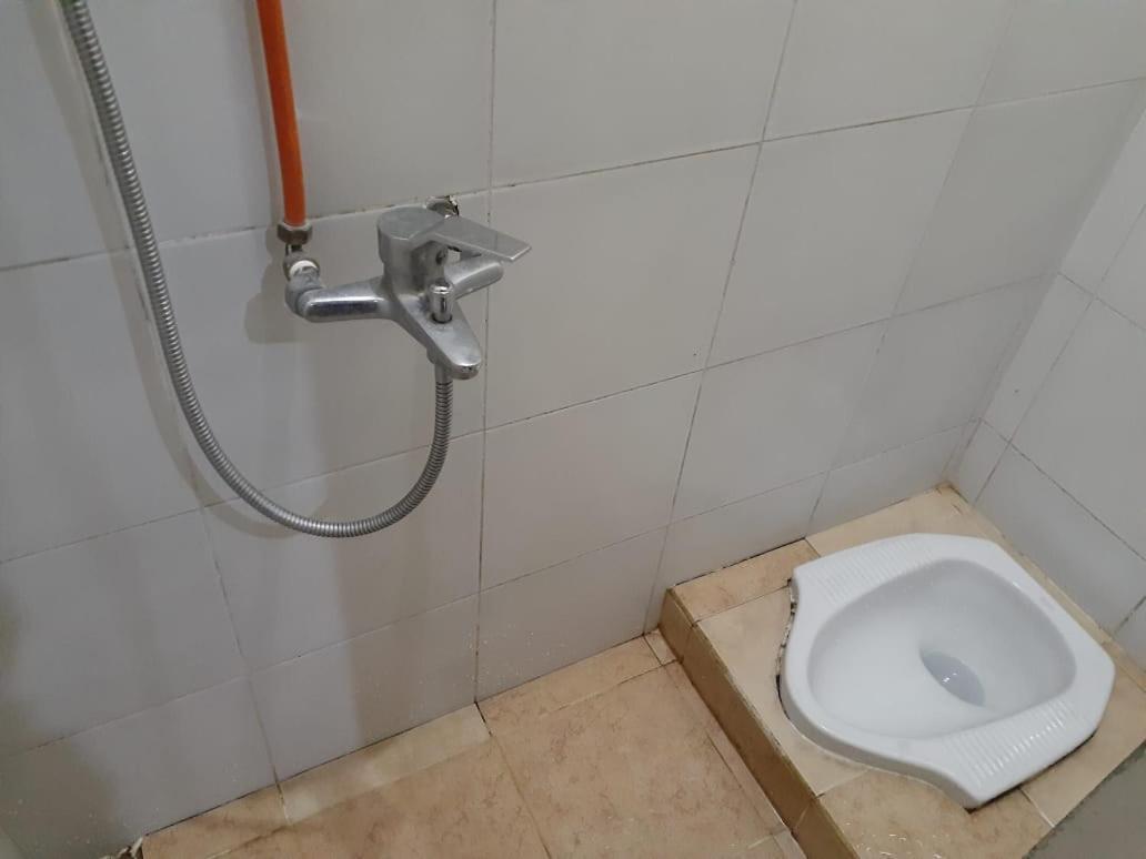 Hotel Kost Carmelia Syariah Baranangsiang Bogor Pokoj fotografie